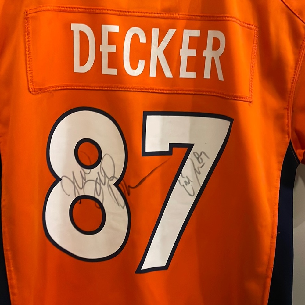Signed Eric Decker and Jessie James Decker Broncos Jersey